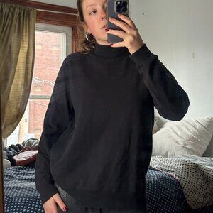 Black mock neck jumper